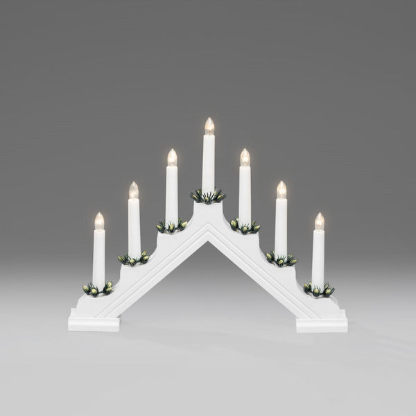 White Wooden Candlestick Lit Window Arch with Pine Decorative Rings