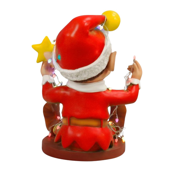 Naughty Christmas Elf Playing With Multicoloured Lights in Red Outfit Display Prop