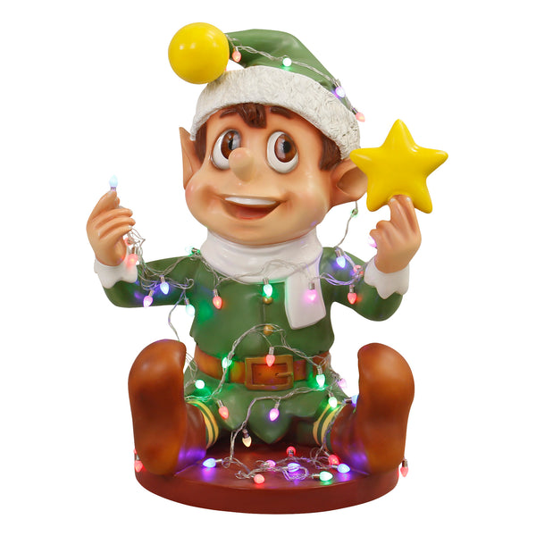 Naughty Christmas Elf Playing With Multicoloured Lights in Green Outfit Display Prop