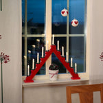 Red 11 Bulb Wooden Candlestick Lit Window Arch
