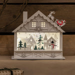 Christmas White Wooden House with Santa On The Roof Scene