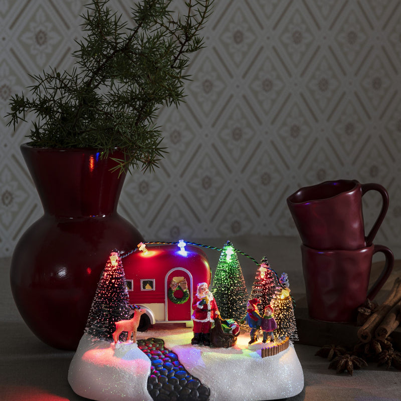 Festive Caravan Scene With Santa