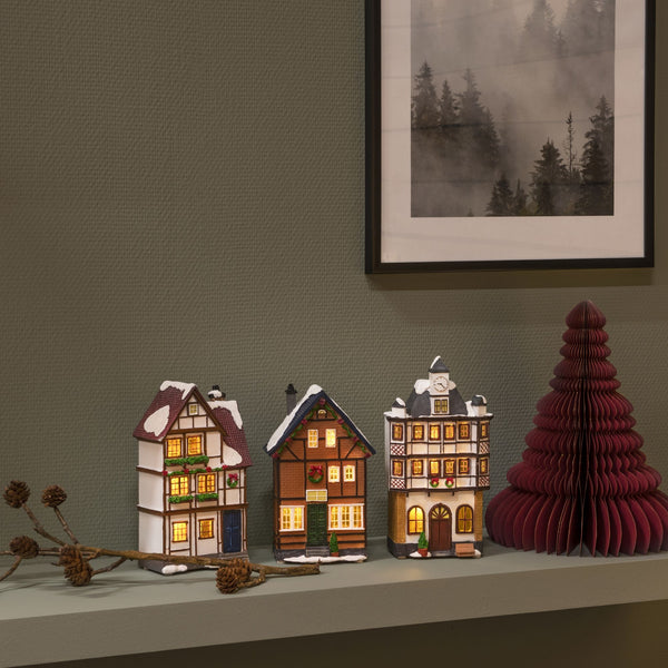 Set of Three Small Snowy Houses Lit with LED Lights