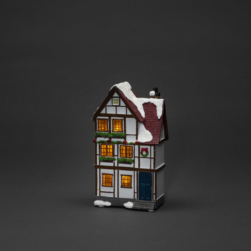 Set of Three Small Snowy Houses Lit with LED Lights