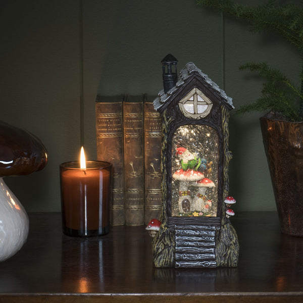 Elf Relaxing on Toadstools Magical Glitter Water Spinner